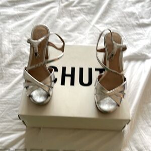 Schutz Keefa candles in silver size 5.5